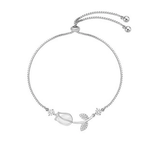 Elegant silver tulip bracelet with opal flower bud and sparkling rhinestone leaves