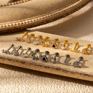 G23 titanium piercing jewelry set with cubic zirconia and shell studs in gold and silver
