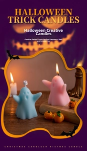 Macro detail of cute ghost scented candles in blue and pink for Halloween decor