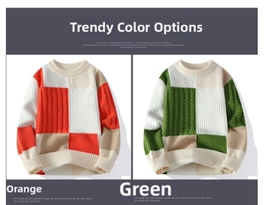 Detail view of twist knit pattern on men's color block sweaters in orange and green