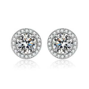 Detailed close-up of halo stud earrings with large round center stone and diamond accents