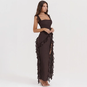 Detail of dark brown dress featuring layered ruffle trim and a high side slit design