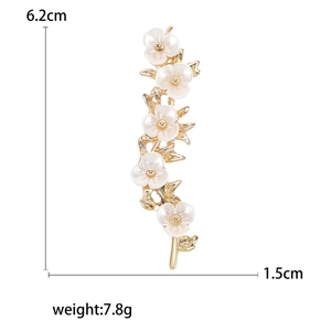 Elegant gold plum blossom branch brooch with white shell petals and size measurements