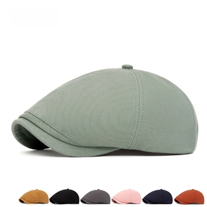 Classic newsboy cap in bean green with multi-color selection on white background