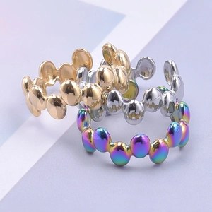 Minimalist stainless steel open bead rings in gold, silver, and iridescent finishes