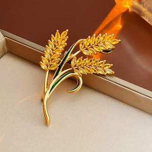 Exquisite gold-plated wheat stalk brooch with yellow zircon and green enamel accents