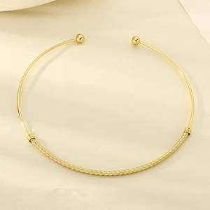 Minimalist gold stainless steel twisted wire choker necklace with polished ball ends