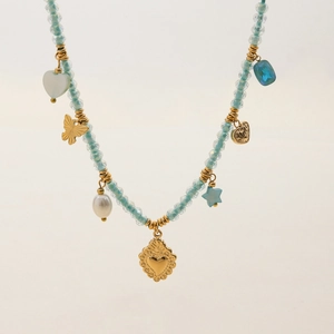 Blue beaded necklace with 18K gold heart, butterfly and pearl pendants on white background