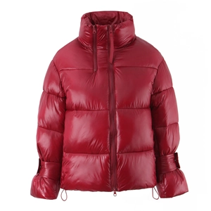 Glossy red cropped puffer jacket with stand collar and drawstring sleeve details on white back