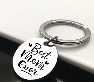 Close-up of Best Mom Ever stainless steel keychain with heart engraving detail