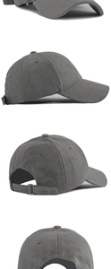 Detail view of dark grey suede baseball cap with adjustable metal buckle and soft texture