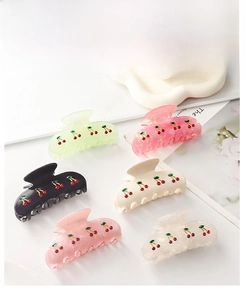 Set of six colorful resin hair claw clips featuring cute red cherry sequin patterns