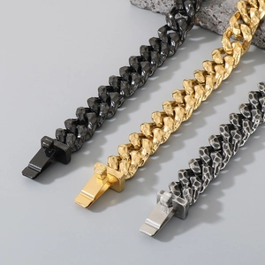 Detail view of hammered Cuban link bracelets in black, gold, and silver stainless steel