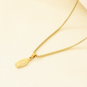 Detail of gold polished box chain and Our Lady of Guadalupe relief pendant