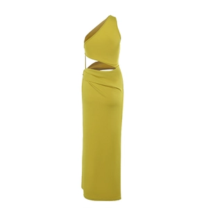 Detailed view of asymmetric mustard green dress featuring waist cutout and side ruching details