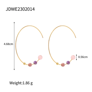 Detail view of gold beaded hoop earrings featuring colorful 0.56cm round stones