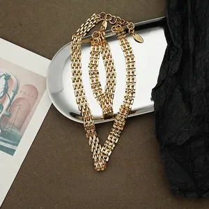 Flat woven gold hip-hop chain set with triple-row link structure and lobster clasp