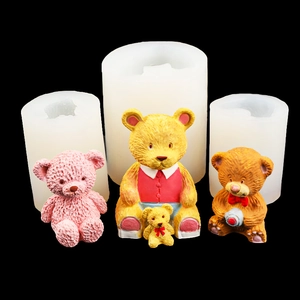 DIY silicone mold set featuring sitting bears with bowties and camera for candle making