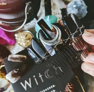Gothic crown hair comb featuring obsidian crystals and silver moon for witchy bride style