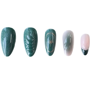 3D cat eye green almond press-on nails with glitter, gold stars, and French tip designs