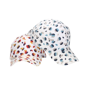 Neutral baseball caps with abstract colorful brushstroke patterns on white cotton twill fabric