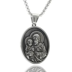 Macro view of oval Saint Joseph relief pendant in polished stainless steel finish