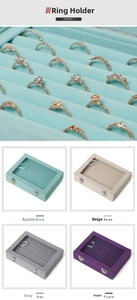 Detail view of 24-slot velvet ring box with clear lid and secure metal locks in four colors