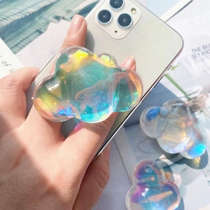 Close-up of holographic cloud phone socket grip with colorful iridescent reflections