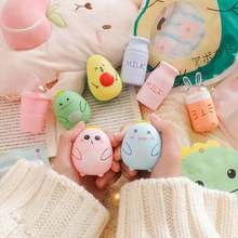 Close-up of cute rechargeable hand warmers in milk carton and animal egg shapes