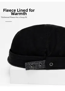 Close-up of black wool newsboy cap featuring thick warm fleece lining and side metal buckles
