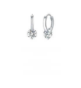 Detailed view of sterling silver hoop earrings with round-cut moissanite dangles