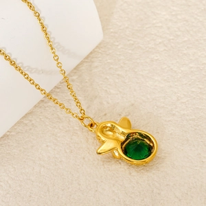 Vintage golden stainless steel Cupid angel pendant necklace with green gemstone