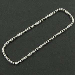 Detailed top view of a 4mm silver hip hop tennis chain with shimmering square crystals