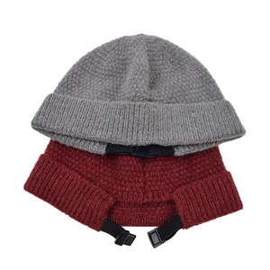 Knitted brimless docker caps in grey and burgundy with adjustable chin strap and thick texture