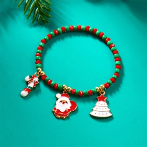 Detail of Christmas bead bracelet with Santa, tree, and candy cane enamel charms
