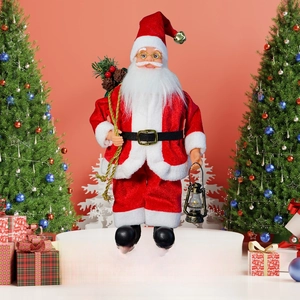 Close-up of standing Santa Claus doll in red velvet with gold lantern and gift bag