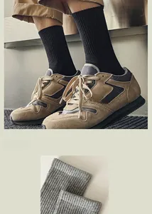 Detail view of cotton crew socks featuring fine knit texture and rib-knit cuffs