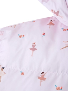 Detail of floral and ballerina print on pink padded jacket with quilting seams
