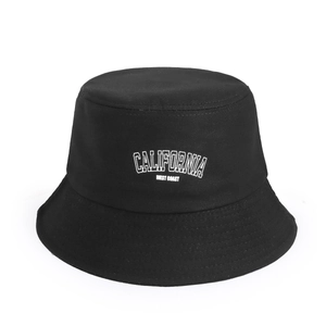 Black cotton bucket hat featuring white California West Coast text embroidery on white background