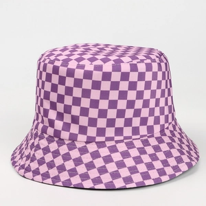 Detailed view of purple checkerboard pattern on soft cotton reversible bucket hat fabric