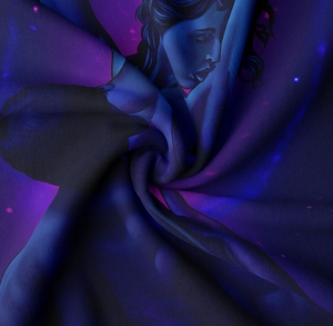 Detailed view of the fabric texture and dark blue artistic mystery lady print on tapestry