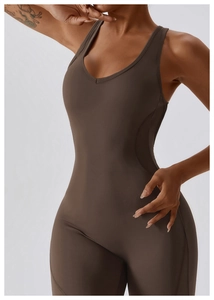 Detail view of the deep brown V-neck yoga jumpsuit showing high-elasticity fabric fit