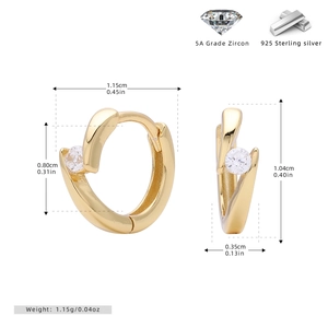 Macro detail of gold S925 sterling silver lightning bolt hoop earrings with 5A zircons