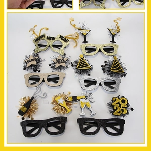 Detailed view of 2025 New Year party eyewear with glitter finish and holiday elements