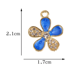 Blue flower charm pendant with gold plating and rhinestones, size 2.1cm by 1.7cm