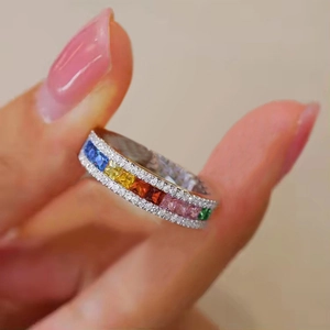 Rainbow eternity ring with colorful square-cut zircons and micro-pave diamonds on silver band