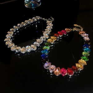 Detail of colorful and clear teardrop crystal necklaces with adjustable lobster clasp