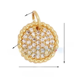 Detail of 10mm gold micro-pave heart charm with white zircon and rope texture border