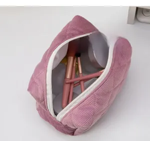 Top view of large capacity corduroy makeup bag with quilted diamond pattern in lavender
