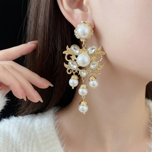 Vintage Baroque pearl drop earrings with crystal floral studs and elegant tassels